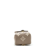 Louis Vuitton Tiny Backpack Bicolor Monogram Empreinte Giant