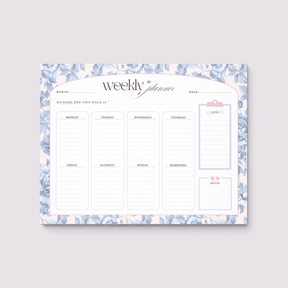 Weekly planner with floral border on a light gray background